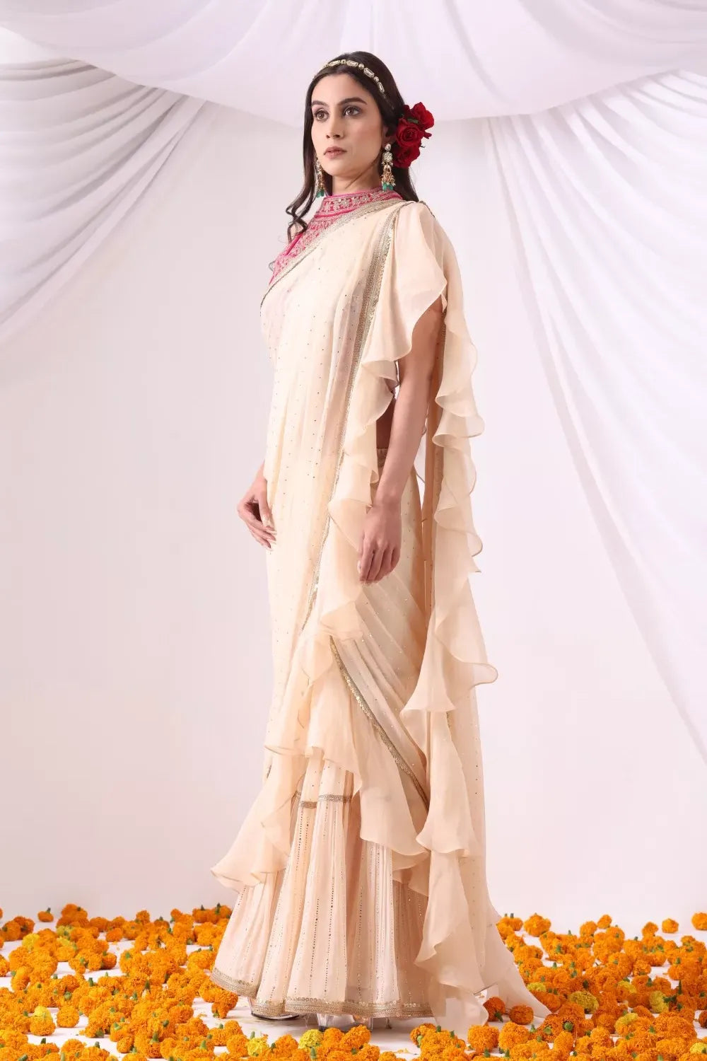 Beige Draped Saree with Magenta Hulter Blouse